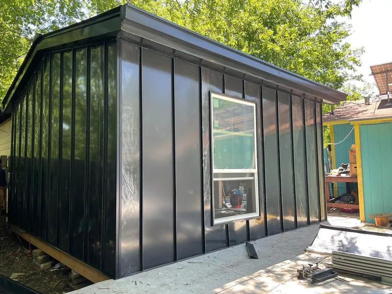 Black standing seam metal wall panels for Metal Roof Installation in Redmond