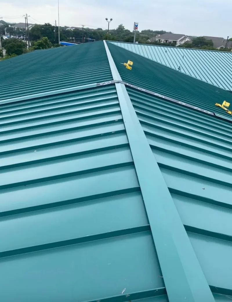 Green commercial metal roof ridge and valley for Metal Roof Repair in Redmond